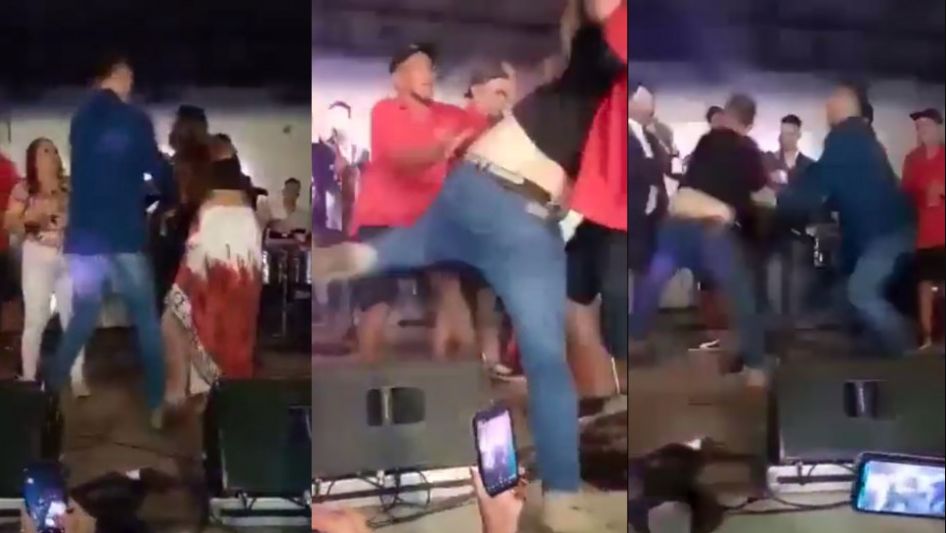 Fan se subió al escenario a besar al cantante y su esposo fue a golpearlo 5 Fan se subió al escenario a besar al cantante y su esposo fue a golpearlo Mientras personal de seguridad intenta retirarla del escenario, un hombre, quien sería el esposo de la fan, que intenta subirse para atacar al cantante. El esposo pretendía lanzar puños pero los escoltas lograron detenerlo.