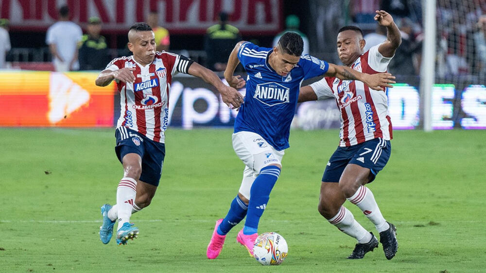 Millonarios cayó de visitante ante 'El Tiburón' 1 Millonarios cayó de visitante ante 'El Tiburón' Al conjunto capitalino se le acabó la buena racha que tenían como visitantes, pues en la tarde de este domingo en el estadio Metropolitano de Fútbol Roberto Meléndez, fue derrotado por el Junior de Barranquilla, Millonarios no demostró la misma calidad de fútbol presentada en su anterior enfrentamiento cuando derrotó 4-3 al América y se perdió así de 3 puntos que le permitirían consolidarse como el puntero de la tabla de clasificación y entrar de forma definitiva a las instancias finales de la liga.