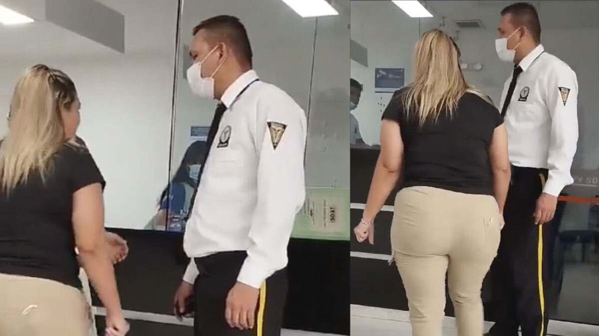 Mujer armó escándalo a supuesta amante de su esposo en EPS A pesar de los intentos de la presunta víctima por atravesar una puerta de vidrio para enfrentar a la mujer, un guardia de seguridad se interpone en su camino.