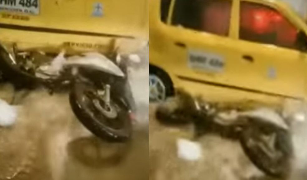 Motociclista casi muere ahogado por fuertes lluvias en Bogotá El hombre se salvó de milagro de morir ahogado, luego de ser arrastrado por la corriente y resultar debajo de un taxi.